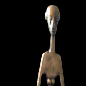 Elegant brass color Figurative Sculpture